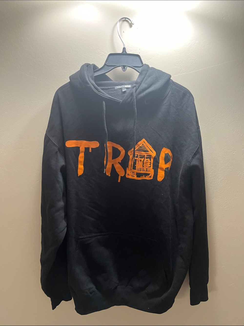 Black Hoodie with Orange 'TRAP HOUSE' Graphic - Men Sweater